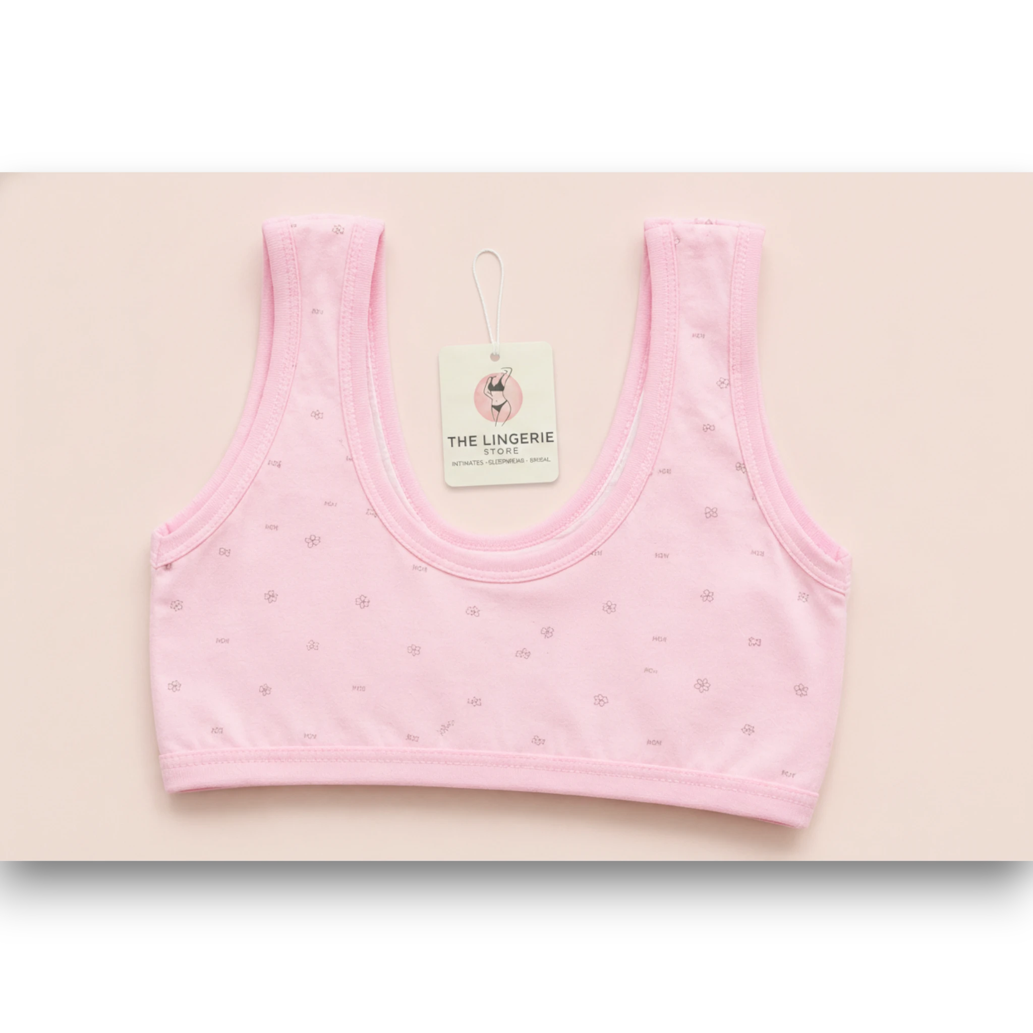 Girls pink cotton training bra with floral print, wire-free crop bra for teens 
