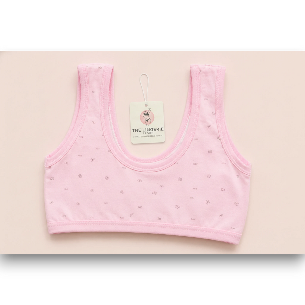 Girls pink cotton training bra with floral print, wire-free crop bra for teens 