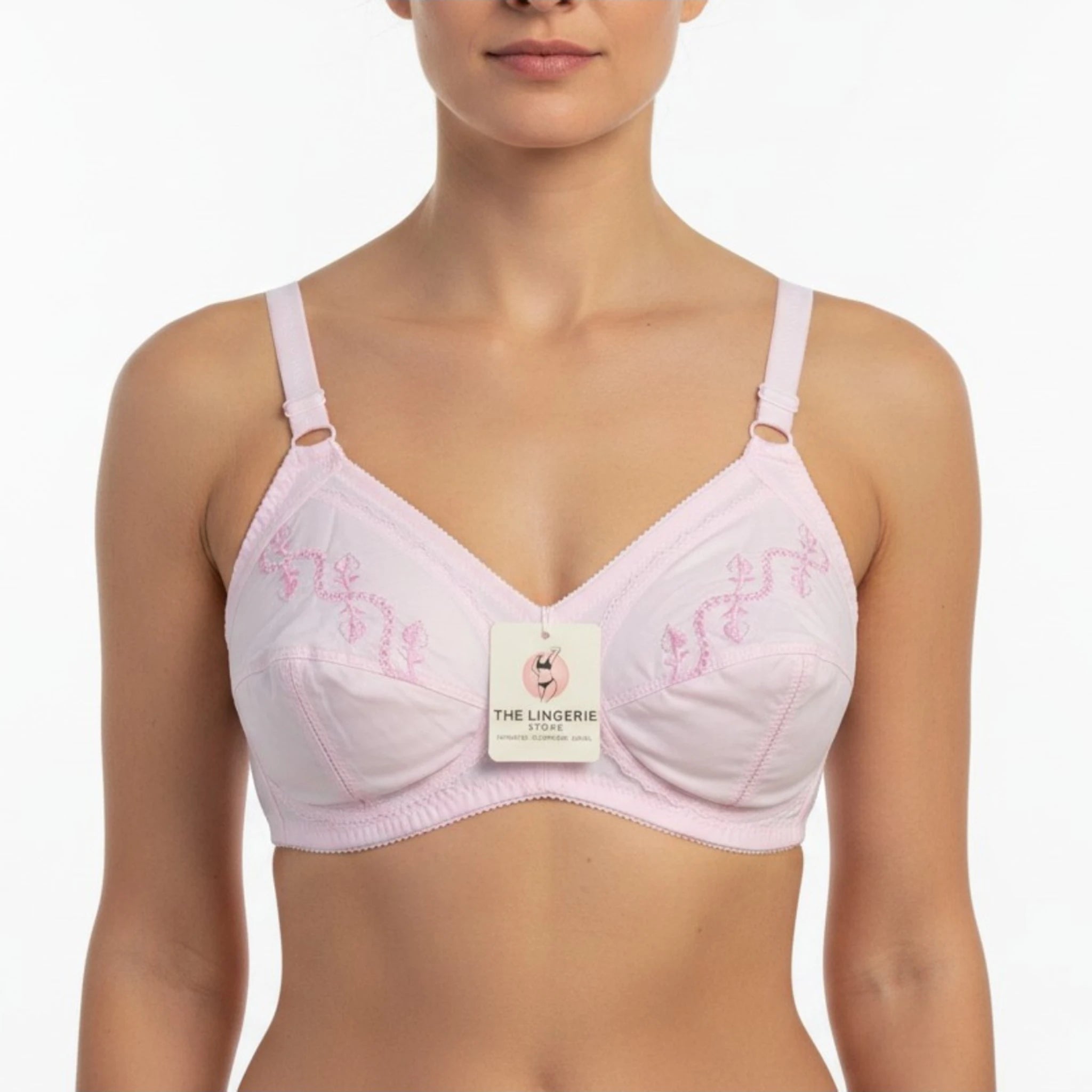 Close-up of light pink comfort cotton bra highlighting delicate floral cup embroidery – TLS