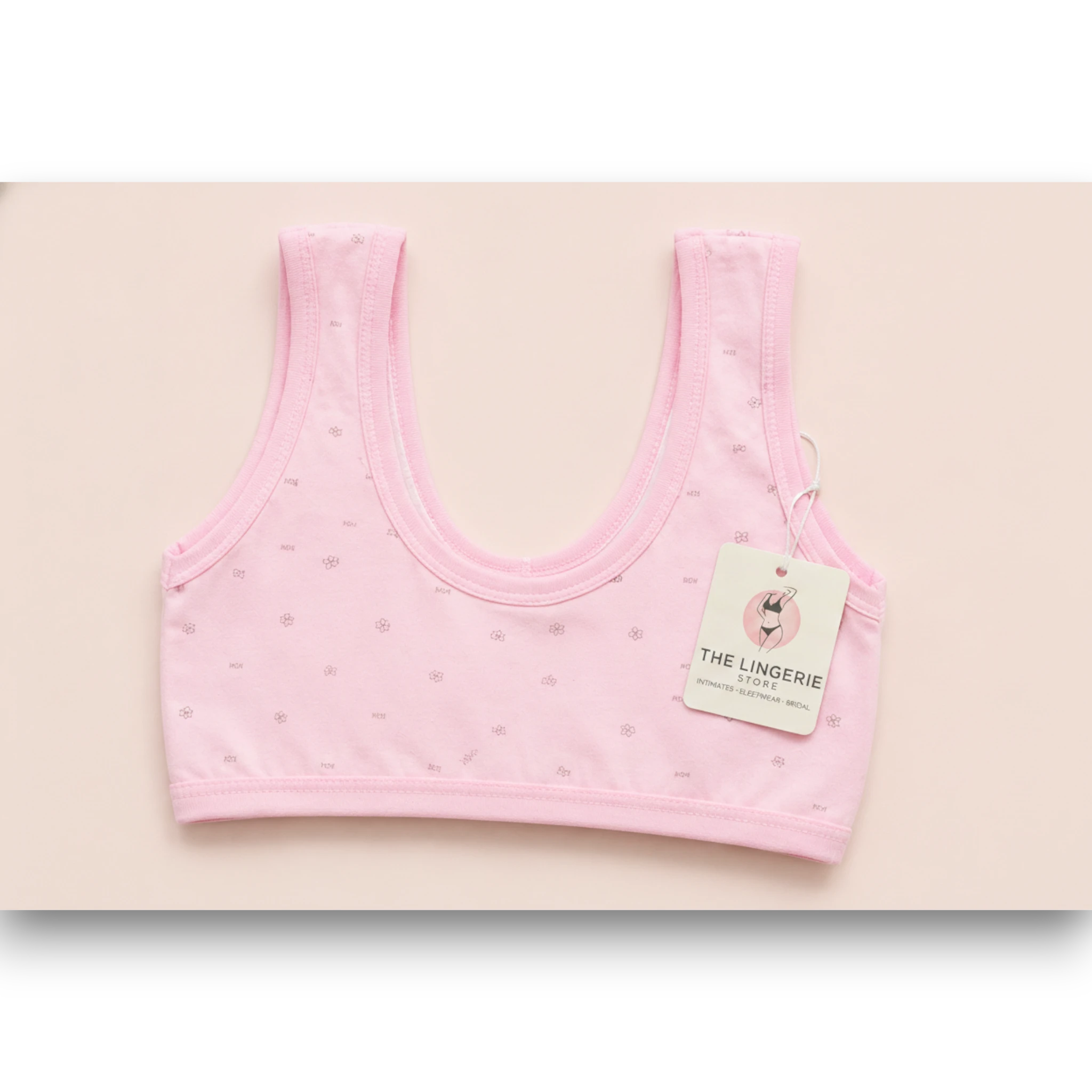 Back view of girls pink floral print cotton training bra with product tag – The Lingerie Store