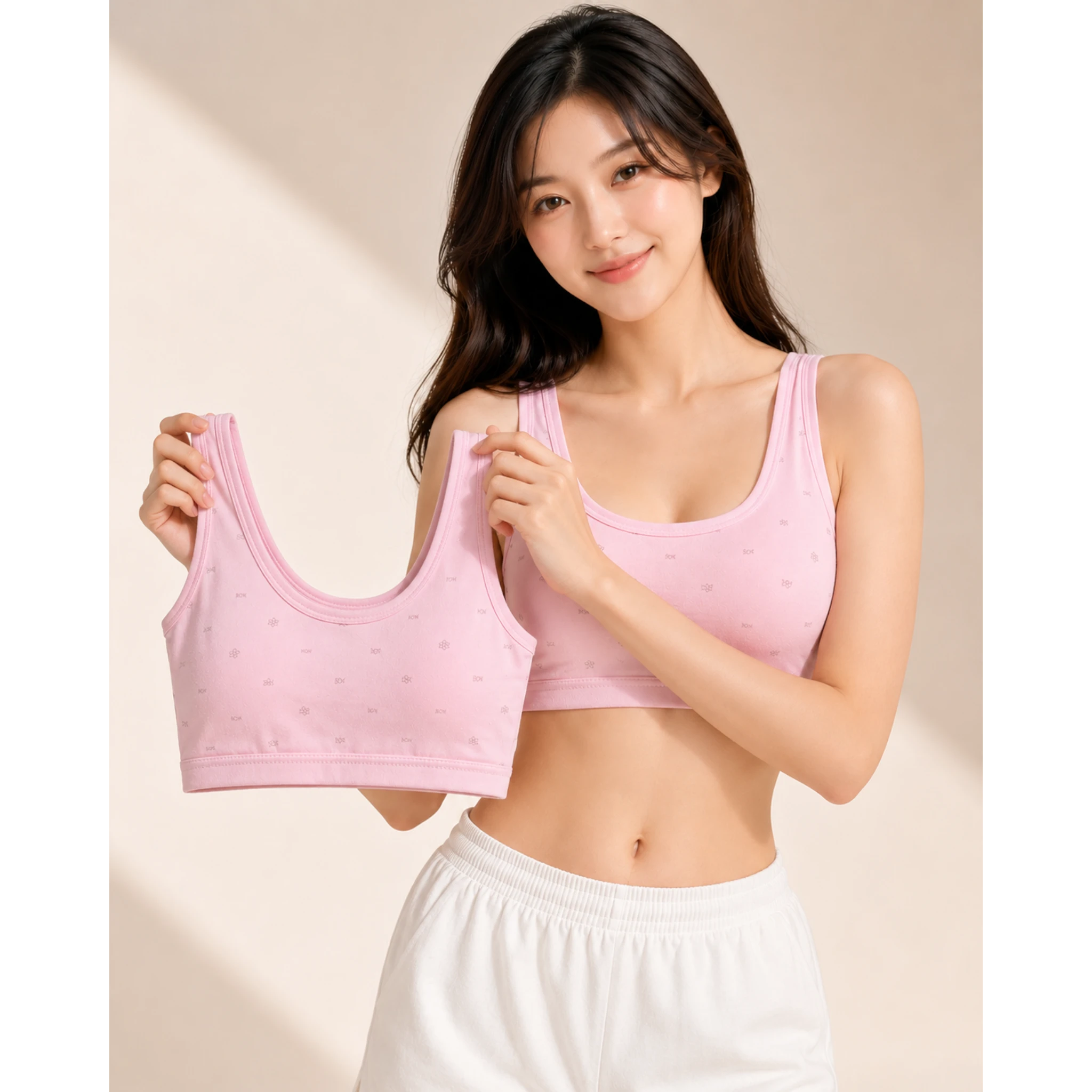 Teen girl wearing pink floral wire-free training crop bra, front view – The Lingerie Store
